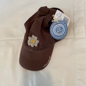 Life Is Good women’s brown hat with daisy